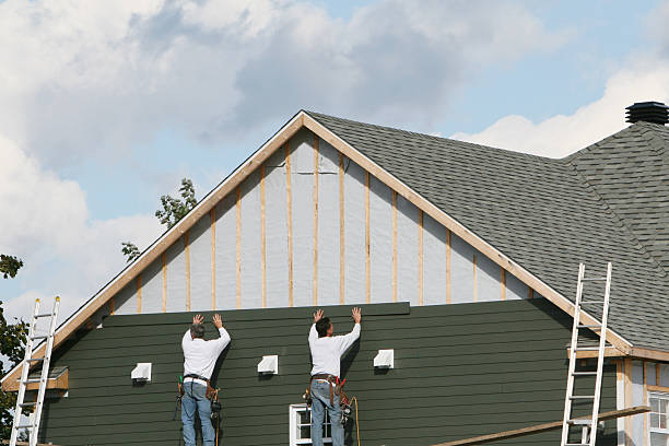 Professional Storm Damage Siding Repair technician working in Potomac, MD